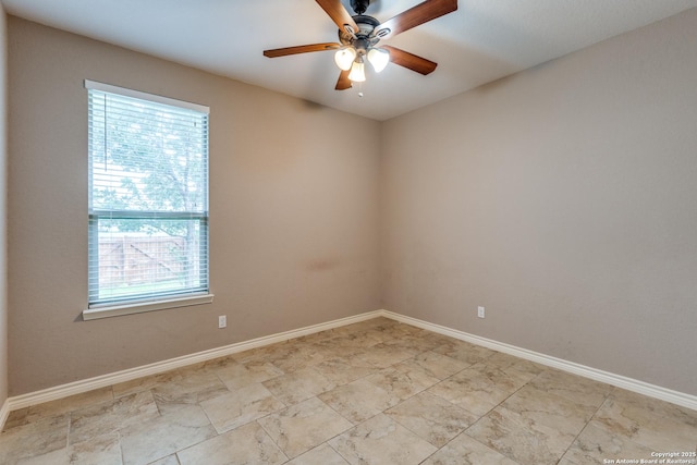 712 Crestview, Floresville, TX 78114 - spare room with plenty of natural light, a ceiling fan, and baseboards
