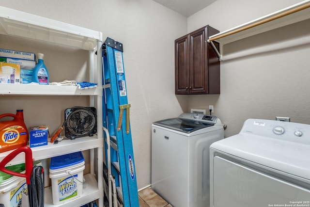 712 Crestview, Floresville, TX 78114 - washroom with washing machine and dryer, cabinet space, and tile patterned floors