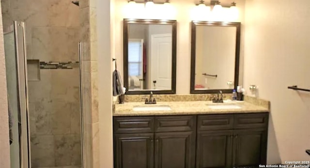 712 Crestview, Floresville, TX 78114 - bathroom featuring a stall shower and double vanity