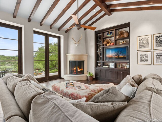 2835 Palomino Spgs, Bandera, TX 78003 - living room with wood finished floors, a large fireplace, and ceiling fan
