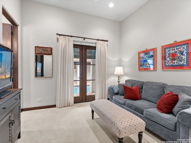 2835 Palomino Spgs, Bandera, TX 78003 - living room featuring baseboards, carpet floors, french doors, and recessed lighting