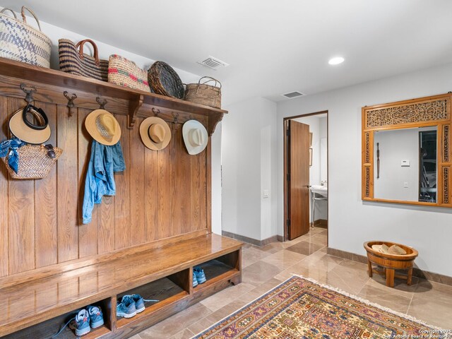 2835 Palomino Spgs, Bandera, TX 78003 - mudroom with baseboards and recessed lighting