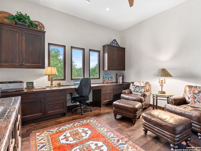 2835 Palomino Spgs, Bandera, TX 78003 - home office with dark wood-style flooring, built in study area, recessed lighting, and ceiling fan