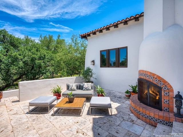 2835 Palomino Spgs, Bandera, TX 78003 - view of patio / terrace with an outdoor living space