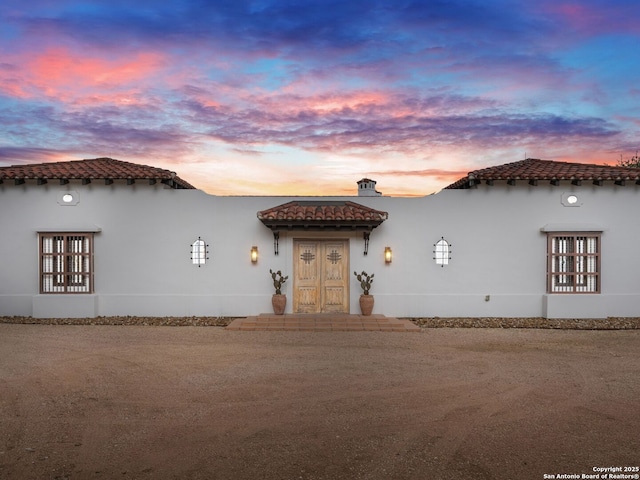 2835 Palomino Spgs, Bandera, TX 78003 - mediterranean / spanish-style home featuring a tile roof and stucco siding