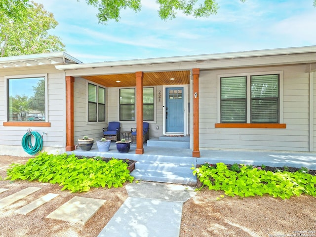 221 Harmon, San Antonio, TX 78209 - entrance to property featuring a porch