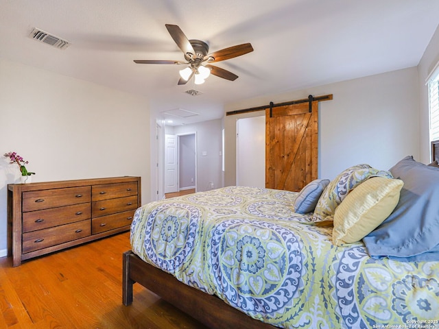 221 Harmon, San Antonio, TX 78209 - bedroom with wood finished floors, a ceiling fan, and baseboards