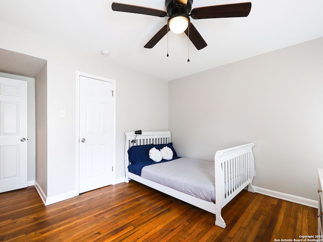 221 Harmon, San Antonio, TX 78209 - bedroom with baseboards, wood finished floors, and a ceiling fan