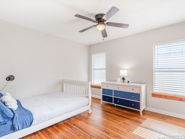 221 Harmon, San Antonio, TX 78209 - bedroom with light wood-style flooring, baseboards, and ceiling fan