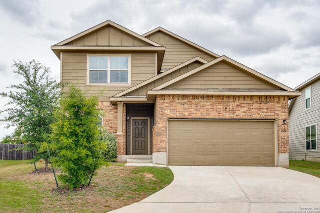 4622 Acclaim, San Antonio, TX 78244 - view of front of home featuring brick siding, concrete driveway, board and batten siding, and a garage