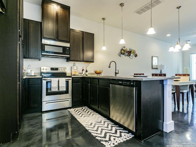 1430 Hays, San Antonio, TX 78202 - kitchen with appliances with stainless steel finishes, concrete floors, a sink, a peninsula, and pendant lighting