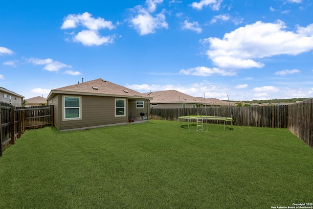 31646 Untrodden Way, Bulverde, TX 78163 - back of house with a trampoline
