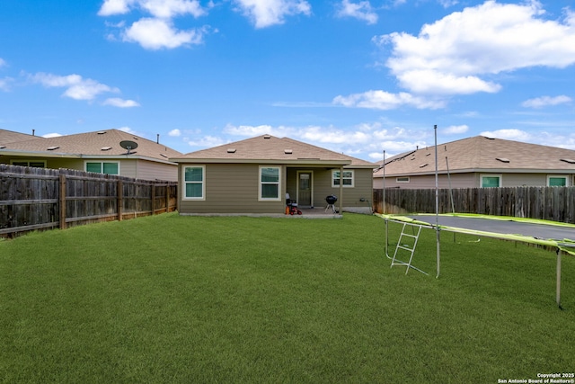 31646 Untrodden Way, Bulverde, TX 78163 - back of property featuring a patio and a trampoline