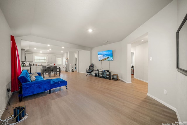 31646 Untrodden Way, Bulverde, TX 78163 - living area featuring light wood finished floors, recessed lighting, and baseboards