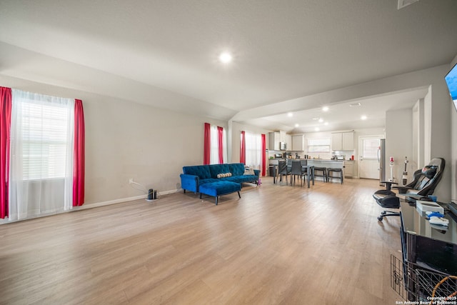 31646 Untrodden Way, Bulverde, TX 78163 - living room with light wood finished floors, recessed lighting, and baseboards