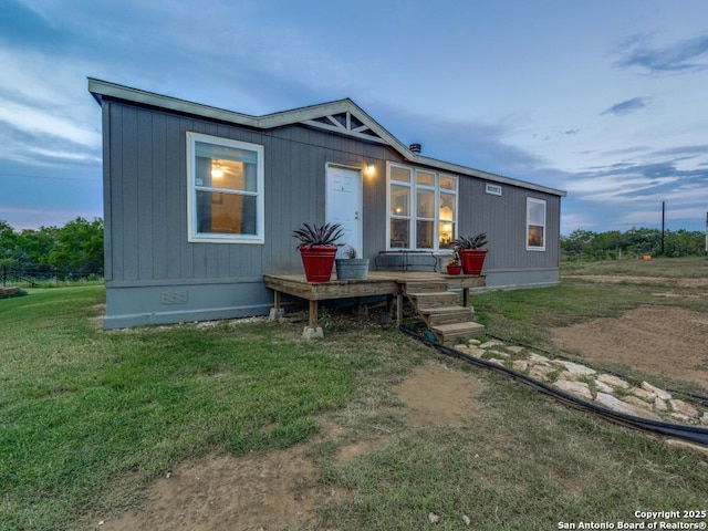 2831 County Road 430, Pleasanton, TX 78064 - manufactured / mobile home with crawl space and a front lawn