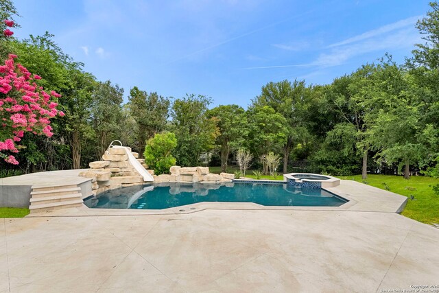 6 Turin Ct, San Antonio, TX 78257 - view of swimming pool with a water slide, a patio, a pool with connected hot tub, and view of wooded area
