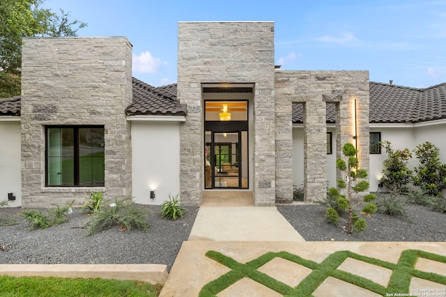 6 Turin Ct, San Antonio, TX 78257 - view of front of property with stucco siding, a tile roof, and stone siding