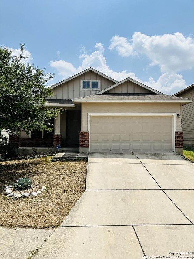 4602 Todds Farm, San Antonio, TX 78244 - craftsman-style house featuring brick siding, an attached garage, concrete driveway, and board and batten siding