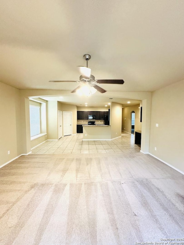 4602 Todds Farm, San Antonio, TX 78244 - unfurnished living room with light carpet, ceiling fan, baseboards, and recessed lighting