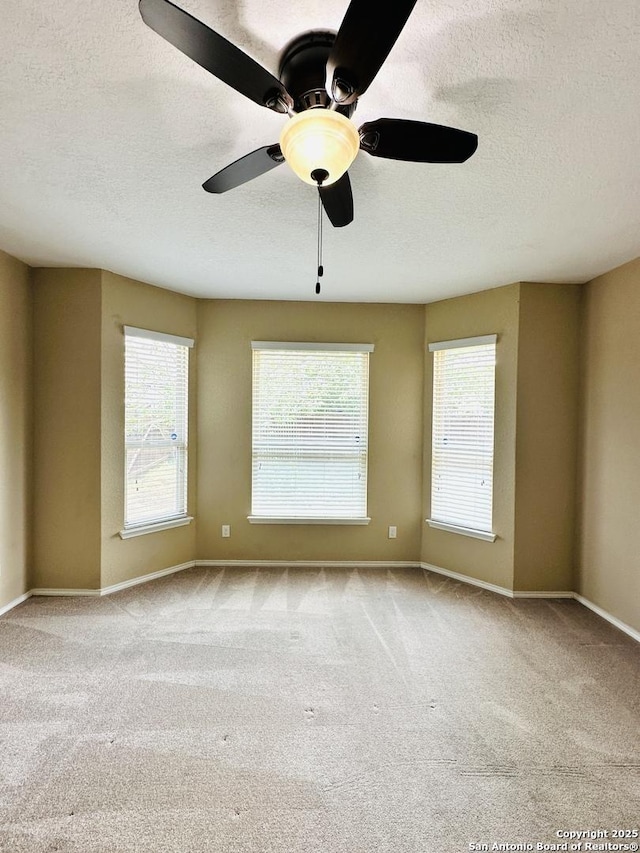 4602 Todds Farm, San Antonio, TX 78244 - spare room with a textured ceiling, carpet, baseboards, and a ceiling fan