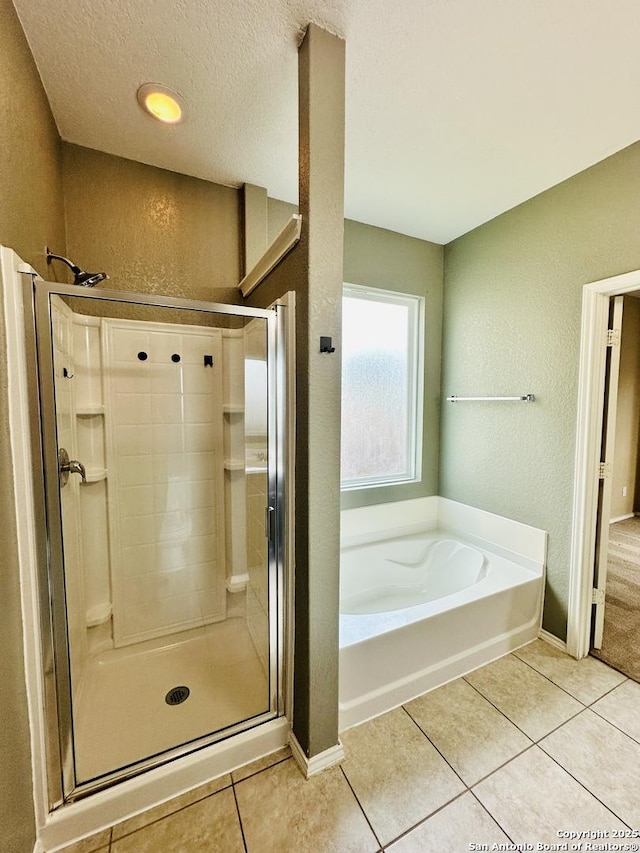 4602 Todds Farm, San Antonio, TX 78244 - full bath with a shower stall, a bath, tile patterned flooring, a textured ceiling, and a textured wall