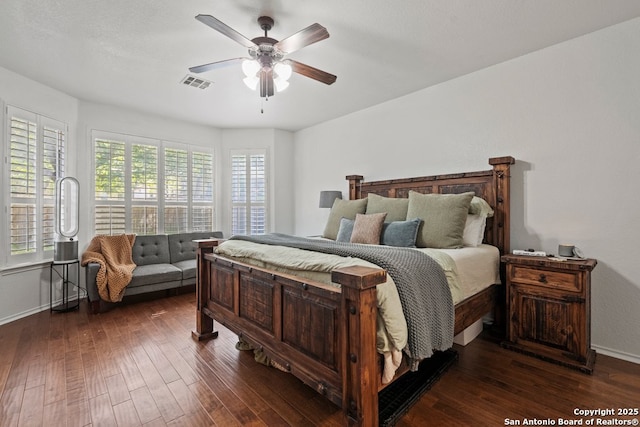 788 San Luis, New Braunfels, TX 78132 - bedroom featuring dark wood-style floors, baseboards, and ceiling fan