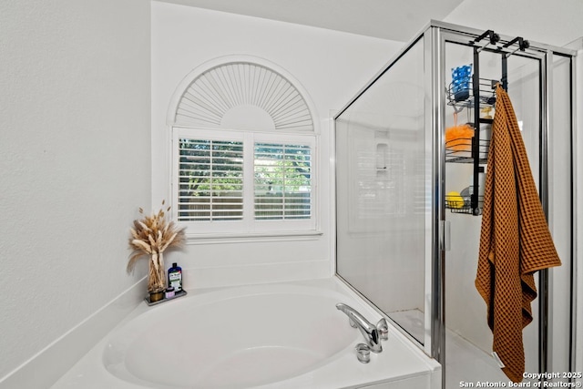 788 San Luis, New Braunfels, TX 78132 - bathroom featuring a bath and a shower stall