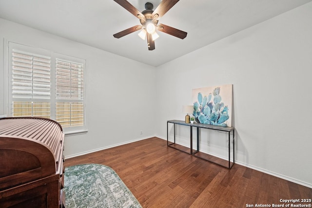 788 San Luis, New Braunfels, TX 78132 - sitting room featuring a ceiling fan, wood finished floors, and baseboards