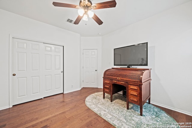 788 San Luis, New Braunfels, TX 78132 - office with a ceiling fan, wood finished floors, and baseboards