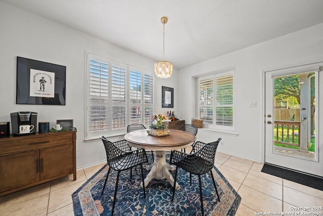 788 San Luis, New Braunfels, TX 78132 - dining room with light tile patterned flooring, healthy amount of natural light, and a chandelier