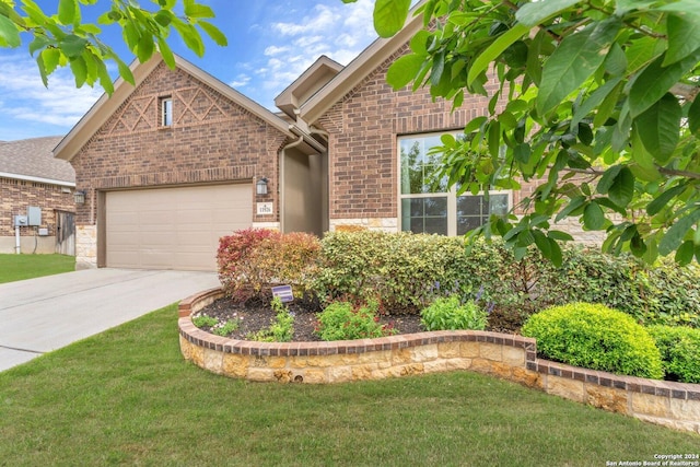11926 Tower Crk, San Antonio, TX 78253 - view of front of property featuring brick siding, concrete driveway, an attached garage, and a front yard