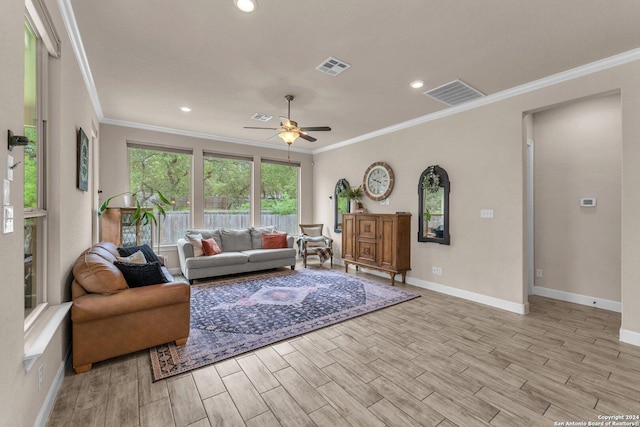11926 Tower Crk, San Antonio, TX 78253 - living area with light wood-type flooring, crown molding, ceiling fan, baseboards, and recessed lighting