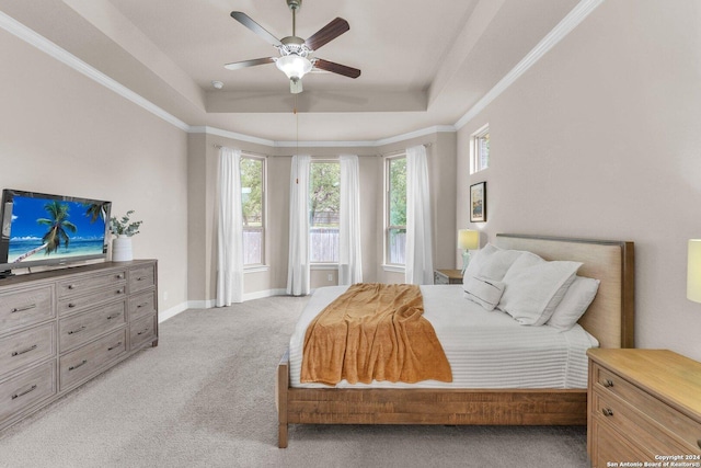 11926 Tower Crk, San Antonio, TX 78253 - bedroom featuring a tray ceiling, light colored carpet, crown molding, baseboards, and a ceiling fan