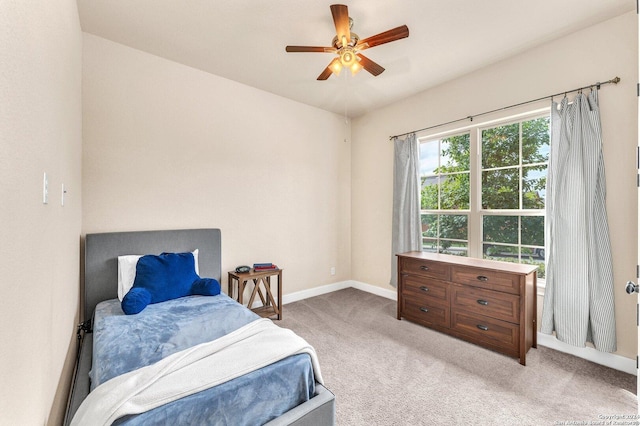 11926 Tower Crk, San Antonio, TX 78253 - bedroom featuring light carpet, baseboards, and a ceiling fan