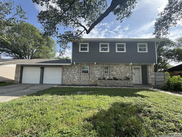 430 Indigo, San Antonio, TX 78216 - colonial-style house featuring stone siding, a garage, a front lawn, and concrete driveway