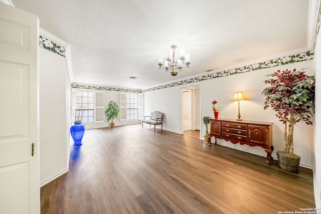 5359 Fredericksburg Unit 513, San Antonio, TX 78229 - misc room with a chandelier, wood finished floors, and baseboards