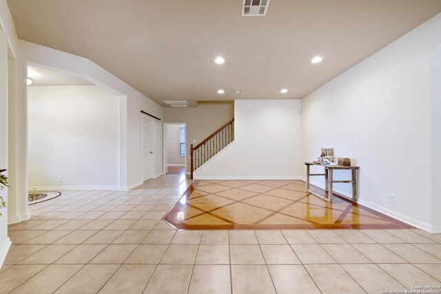 1711 Mountain, San Antonio, TX 78258 - unfurnished room featuring light tile patterned floors, recessed lighting, stairs, and baseboards