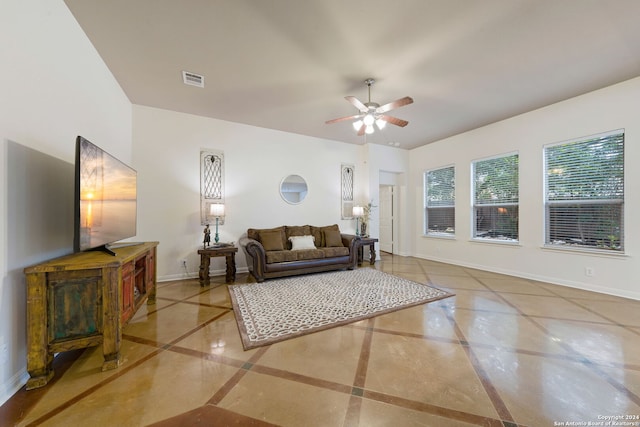 1711 Mountain, San Antonio, TX 78258 - living room featuring inlaid floor details, baseboards, and a ceiling fan