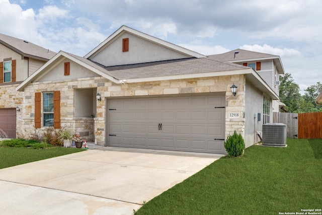 12918 Lilly Pass, San Antonio, TX 78254 - view of front facade featuring stone siding, central AC, an attached garage, and concrete driveway