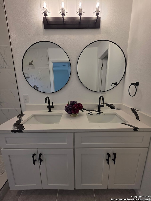 124 Baylor, San Antonio, TX 78204 - full bathroom featuring double vanity and tile patterned floors