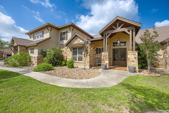 136 Eagle Crst, Spring Branch, TX 78070 - view of front of home featuring french doors, stone siding, stucco siding, and a front yard