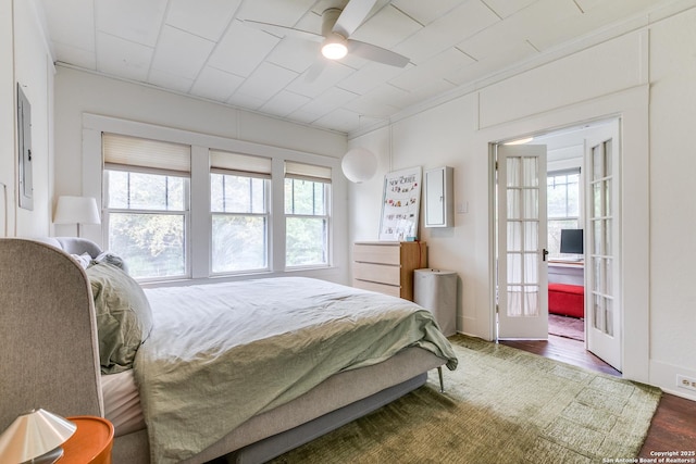 1007AND1013 Fulton, San Antonio, TX 78201 - bedroom with multiple windows, wood finished floors, french doors, and electric panel