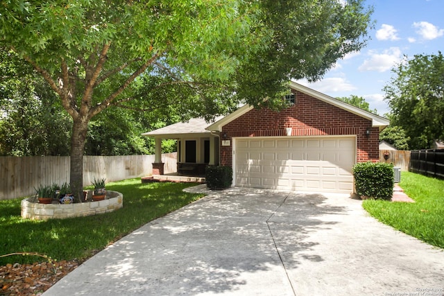 9519 Braun Shr, San Antonio, TX 78250 - view of front of house with brick siding, driveway, and an attached garage