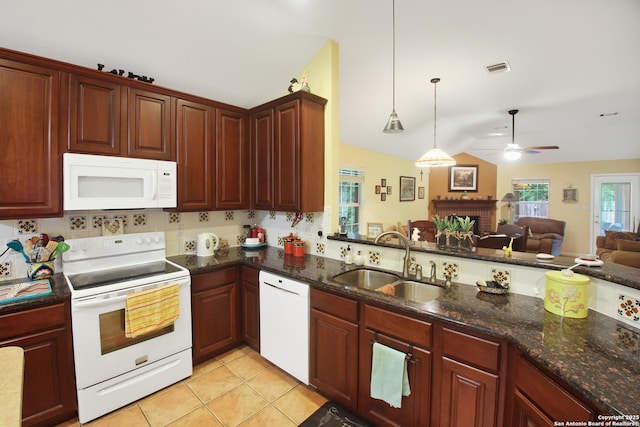 9519 Braun Shr, San Antonio, TX 78250 - kitchen featuring white appliances, a sink, a ceiling fan, open floor plan, and vaulted ceiling
