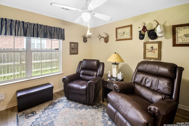 9519 Braun Shr, San Antonio, TX 78250 - sitting room featuring baseboards, a ceiling fan, and wood finished floors