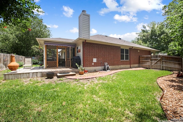 9519 Braun Shr, San Antonio, TX 78250 - rear view of house featuring brick siding, a deck, and a chimney