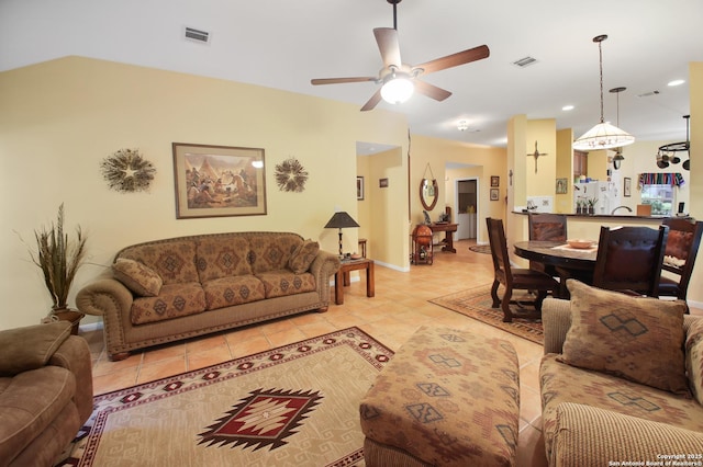 9519 Braun Shr, San Antonio, TX 78250 - living room featuring light tile patterned floors, ceiling fan, baseboards, and recessed lighting