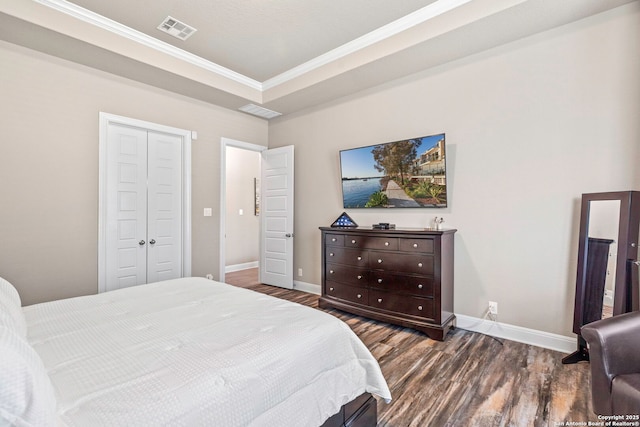27418 Camellia Trce, Boerne, TX 78015 - bedroom with wood finished floors, crown molding, and a closet