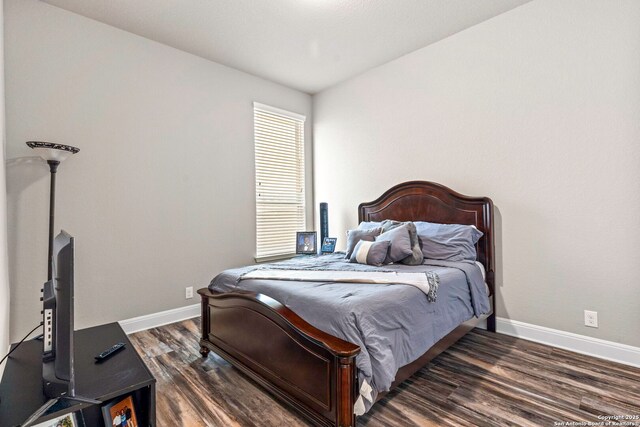 27418 Camellia Trce, Boerne, TX 78015 - bedroom featuring wood finished floors and baseboards
